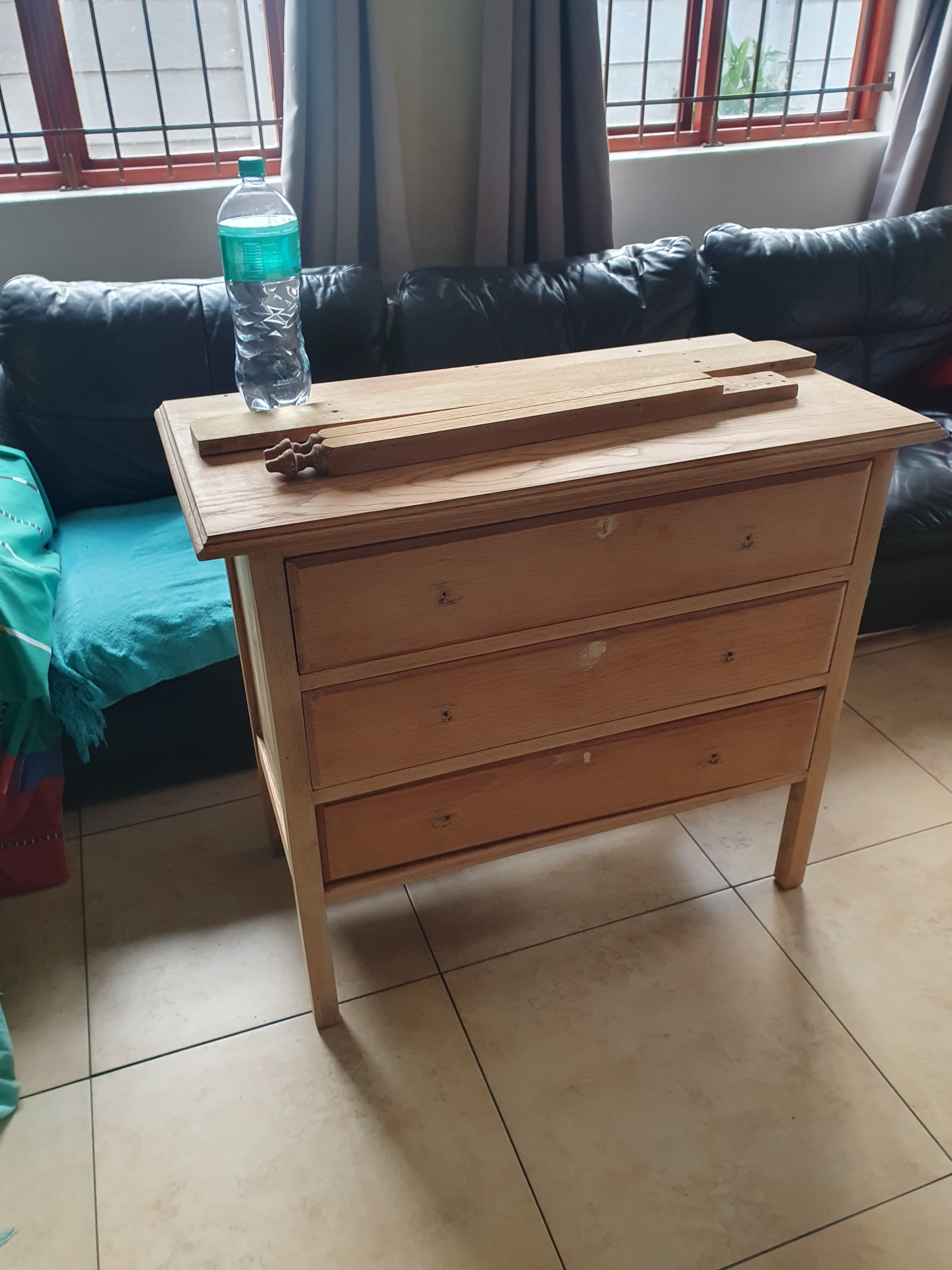 Damage from the former mirror fittings repaired with solid wood dowel plugs